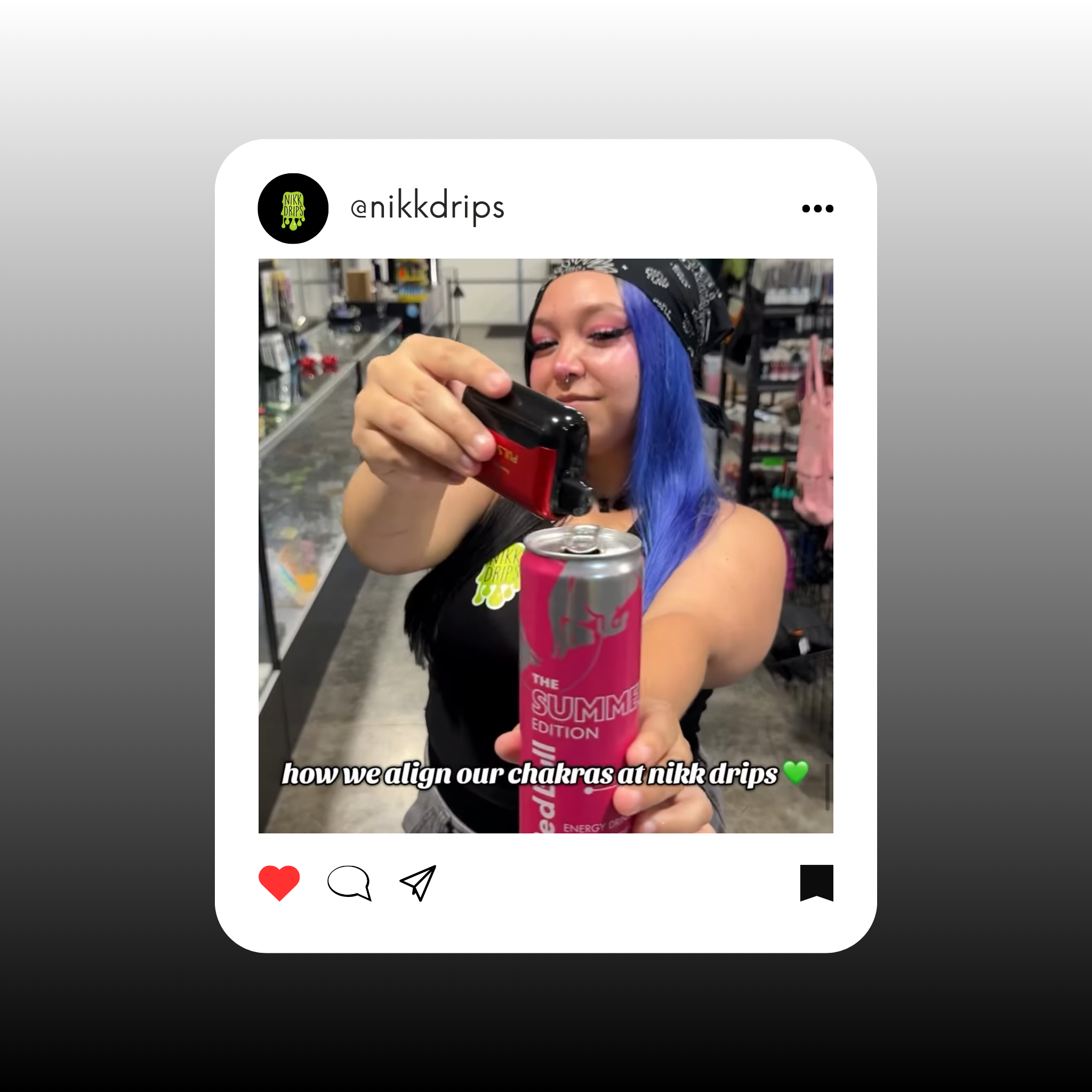 Person with blue hair taking a photo of a can, showcasing the vibrant energy at Nikk Drips.