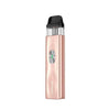 Vaporesso XROS 4 Mini in rose gold color, showcasing sleek design and top-filling pod.