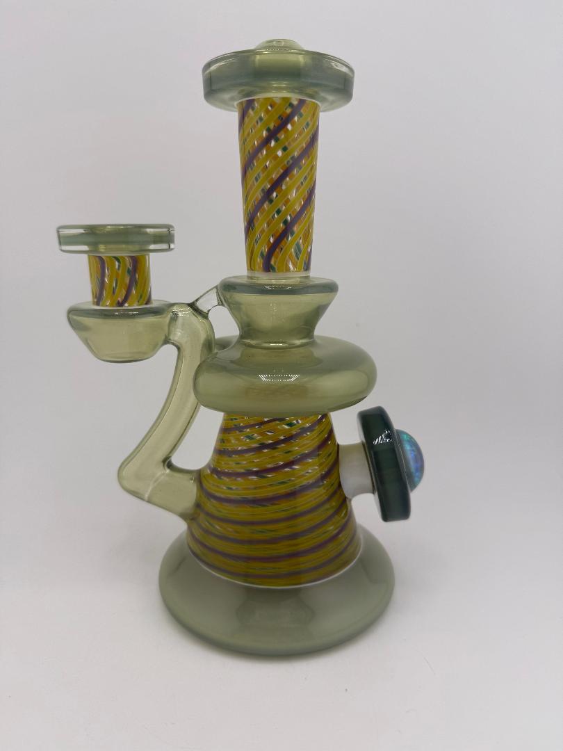 Bowman Glass X Vogel Glass Rettitube, a decorative glass water pipe featuring vibrant yellow and purple stripes.
