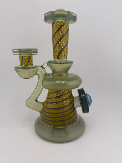 Bowman Glass X Vogel Glass Rettitube, a decorative glass water pipe featuring vibrant yellow and purple stripes.