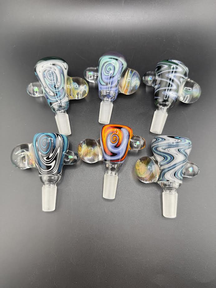 Collection of Highgrade 14mm glass heady slides showcasing unique swirl designs and vibrant colors.