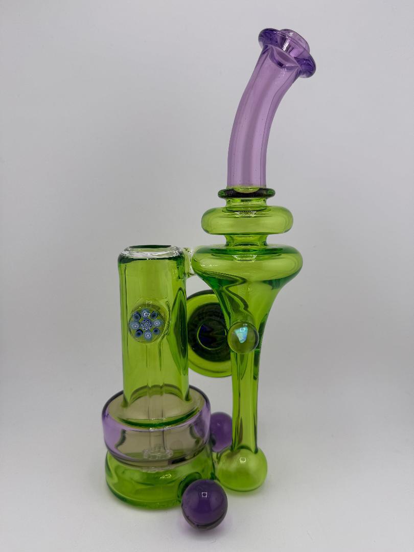Crondo Glass Green & Purple RBR Shaped Recycler showcasing bold colors and sleek design, perfect for flavorful sessions.