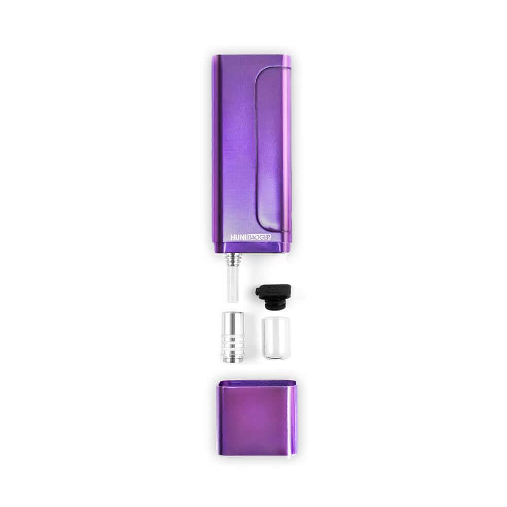 Huni Badger portable device in purple with accessories, showcasing its compact design for easy herbal extraction consumption.
