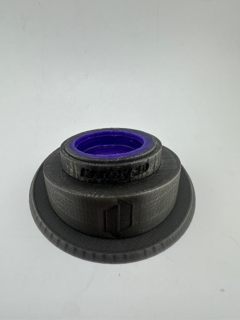 Kandy Custom 3-D Prints Puffco Peak Pro glass stand in black color showcasing storage and display features.