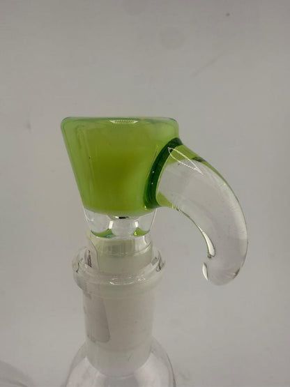 Close-up of a green Glass Distractions martini bowl with horn handle, showcasing craftsmanship and vibrant design.