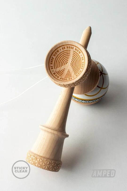 Sweets Kendama - Johnny Raekes Amped design featuring a wooden kendama with unique engravings and patterns.