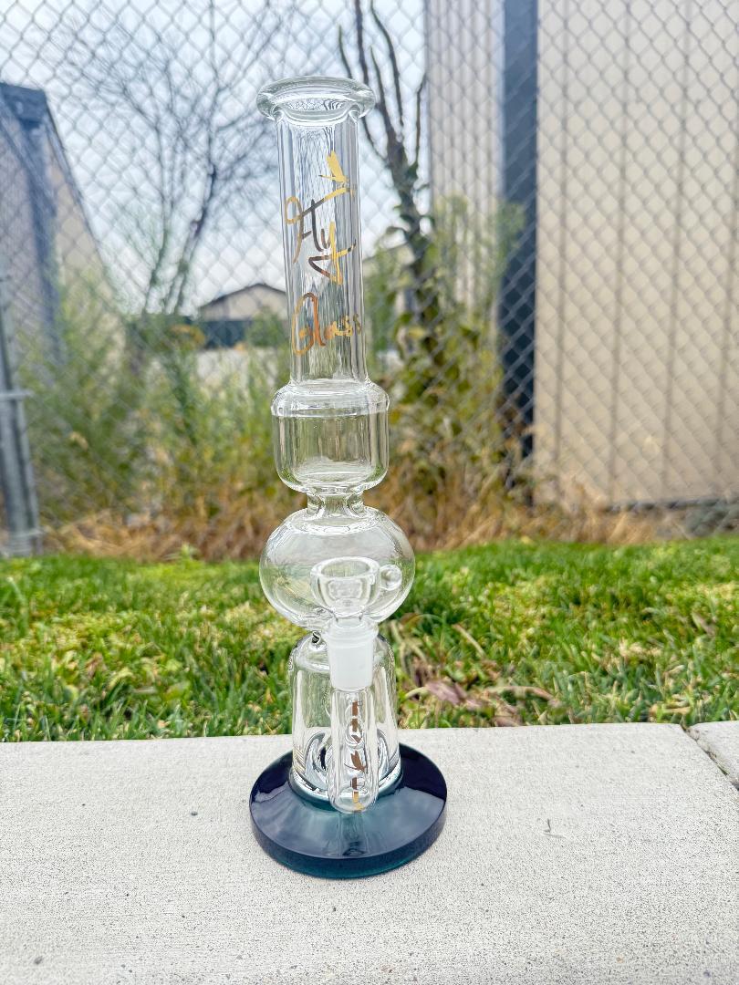Fly Glass Multi-Chamber Straight Tube 14mm 90° designed for advanced filtration and smooth hits, featuring a sleek glass finish.