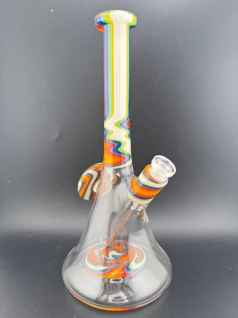 Filla John Glass Circus Beaker with rainbow colors, 10mm 45° joint, stylish design for smooth hits.