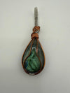 Fluid Central wire-wrapped labradorite pendant showcasing natural beauty and artisanal craftsmanship.