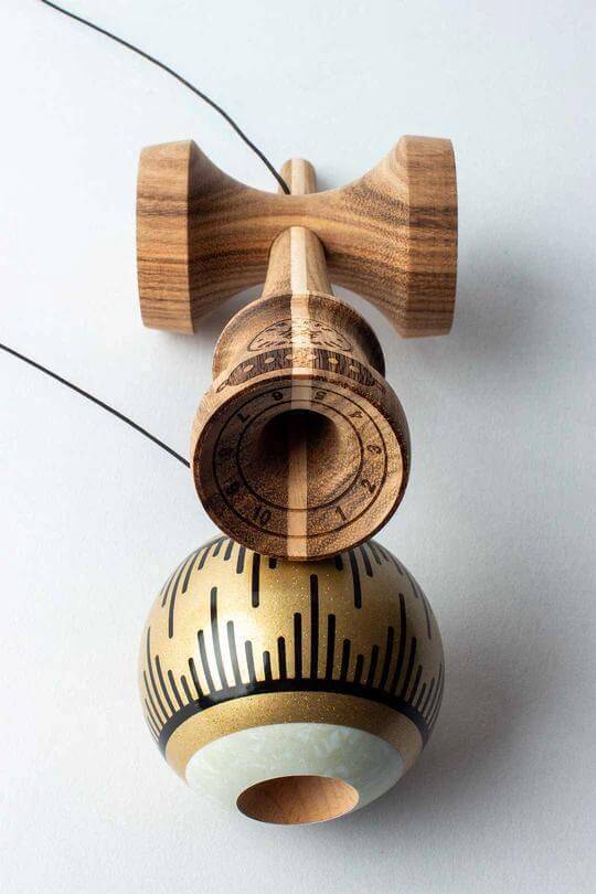 Sweets Kendama Boogie T Gold - Amped with gold tama, classic design, and wood ken for optimal spikes and tricks.