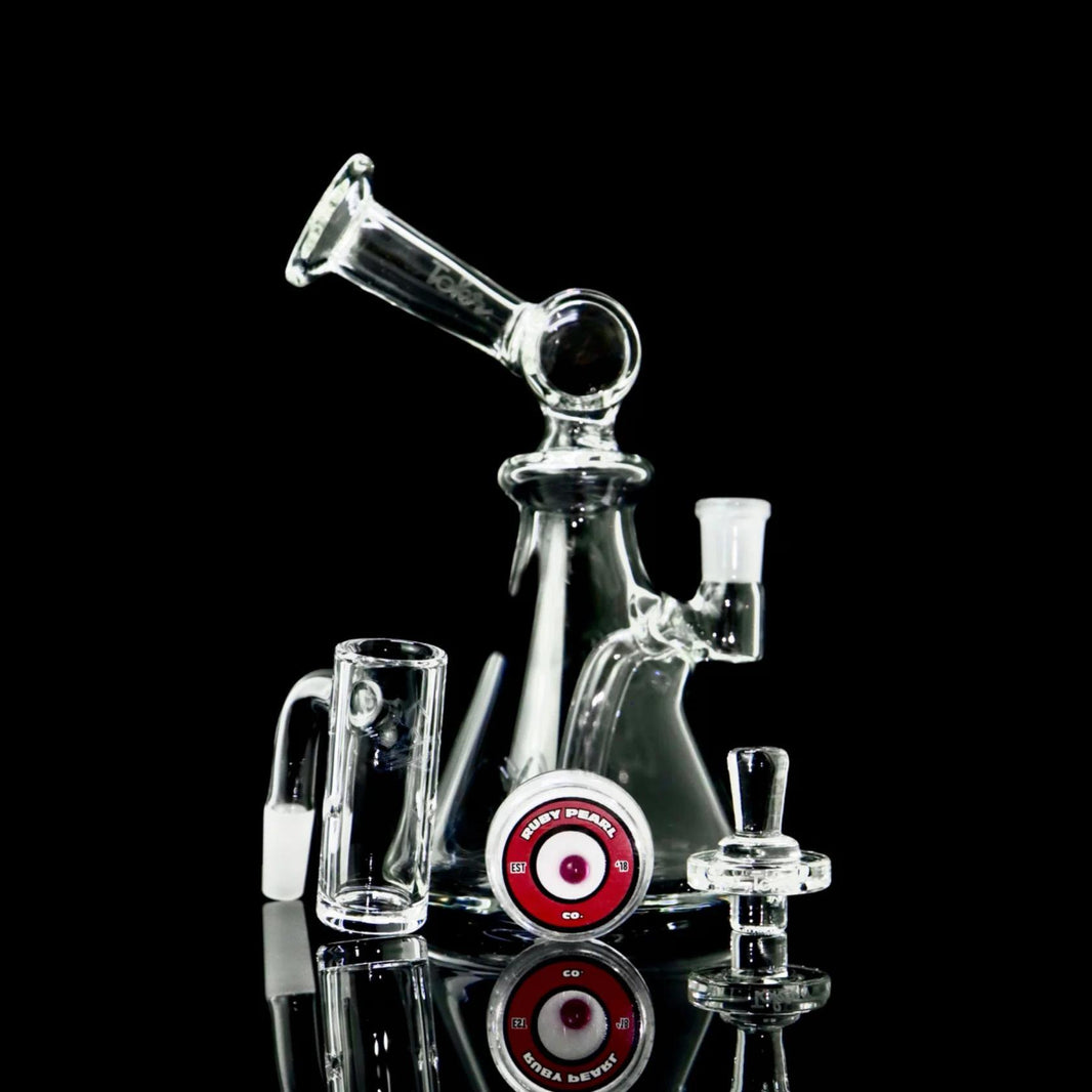Tokr Glass Rig Kit - Bent Neck with clear glass design and included accessories like auto spinner and terp pearl.