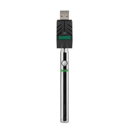 Ooze Twist Pen Slim vape battery with USB charger, sleek design for oil cartridges and wax attachments.