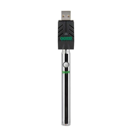 Ooze Twist Pen Slim vape battery with USB charger, sleek design for oil cartridges and wax attachments.