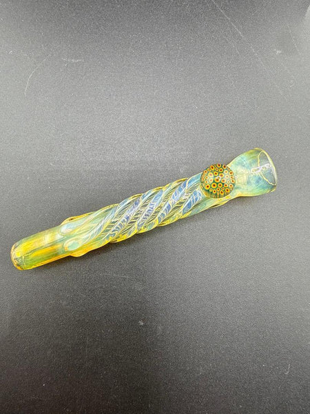 Home Blown Glass Chillum Pipe - Fumed & Twisted w/ Millie Accent on a dark background.