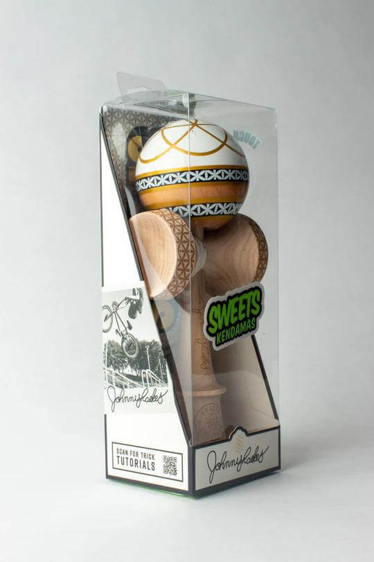 Sweets Kendama Johnny Raekes Amped in packaging showcasing unique design and branding for kendama enthusiasts.