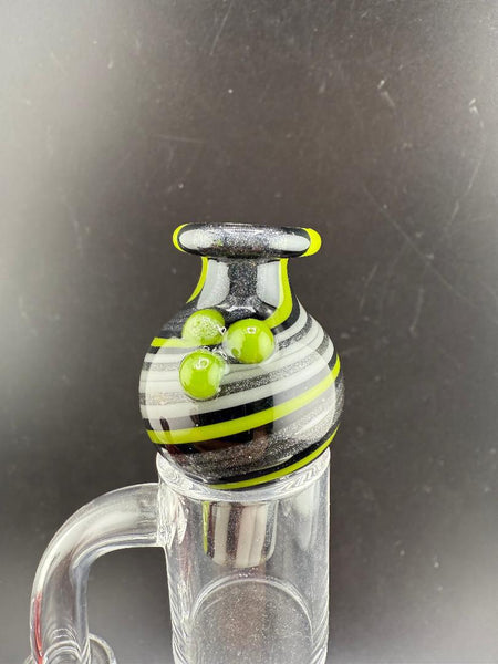 Filla John Line Worked Bubble Cap featuring bold colors and intricate line work, enhancing dabbing setups.