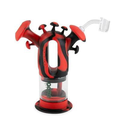 Ooze Trip Pipe silicone water bubbler and dab rig with mushroom-inspired design in red and black colors.