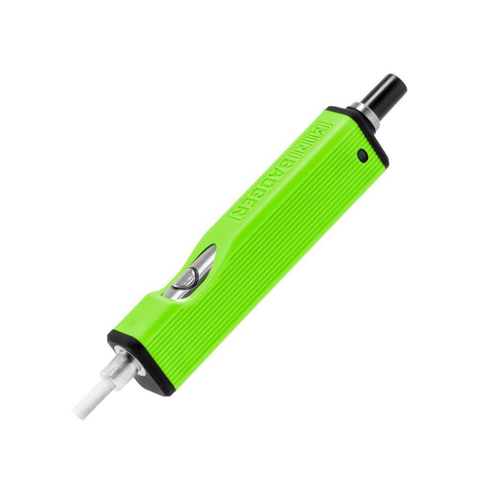 Huni Badger Mini portable device in vibrant green, featuring a ceramic heating tip and compact design for discreet use.
