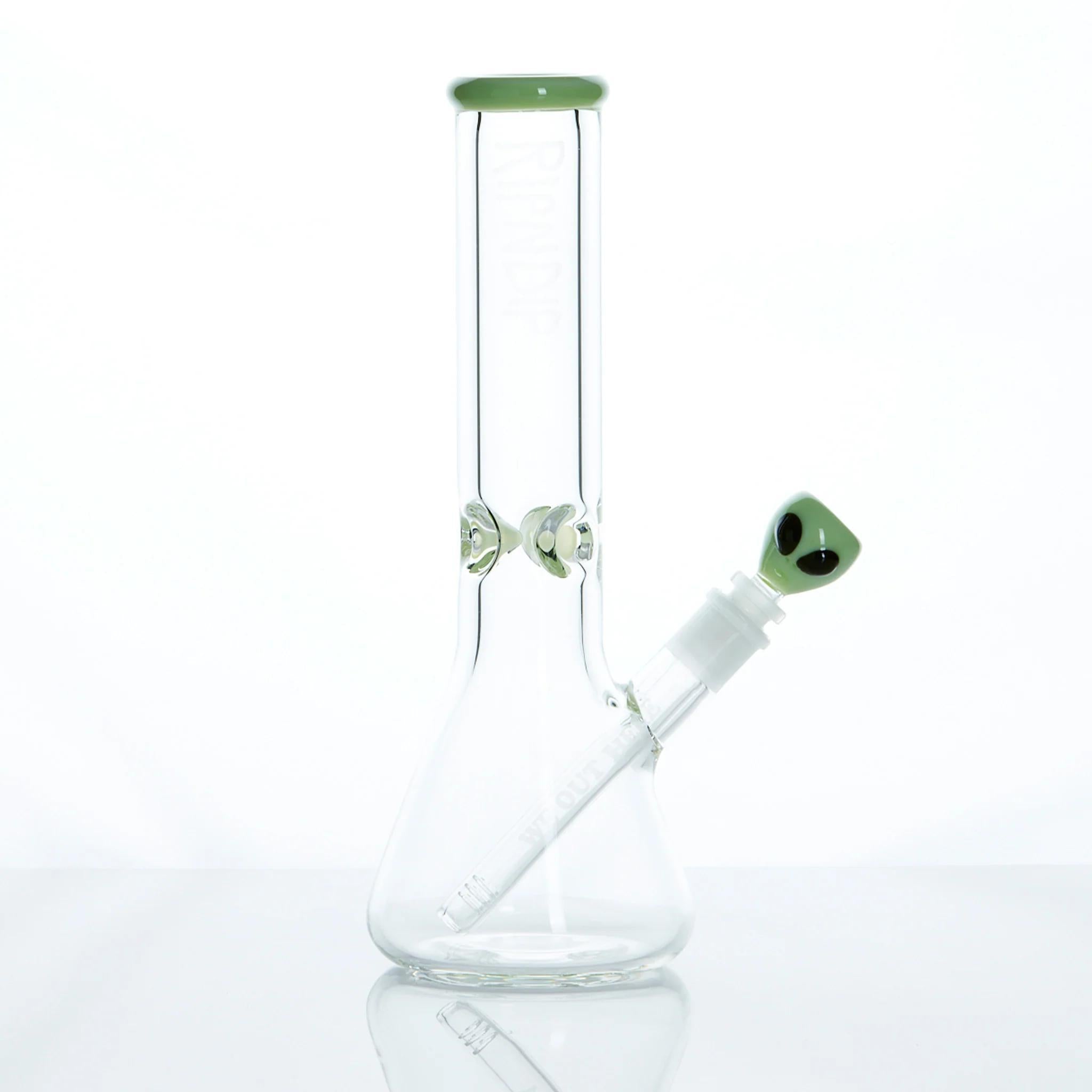RipNDip We Out Here Beaker – Limited Edition 12" glass water pipe with bold alien-themed artwork.