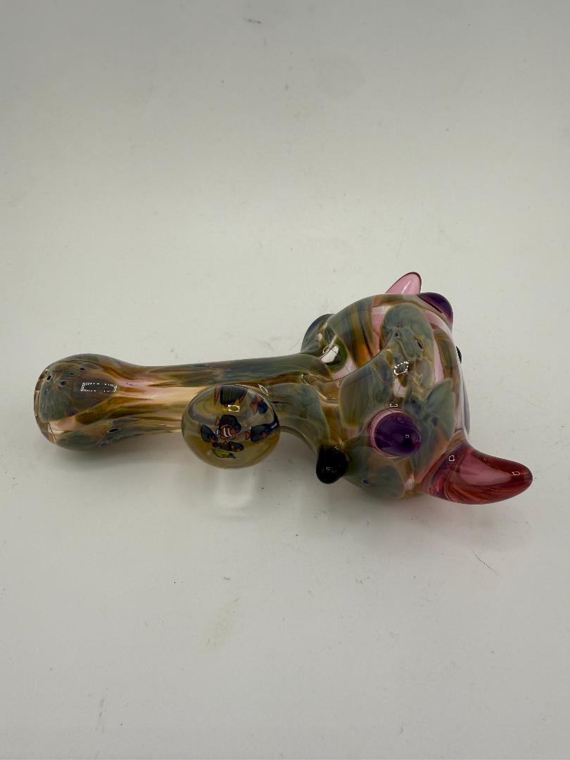 Lylo Glass Heady Green Frit Pink Horn Pipe with vibrant colors and pink sculpted horns, handcrafted in Spokane, WA.