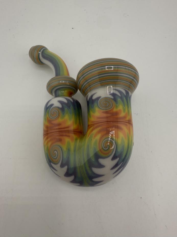 Mcdoogle Works Sherlock Rainbow pipe featuring vibrant swirling colors and unique design.