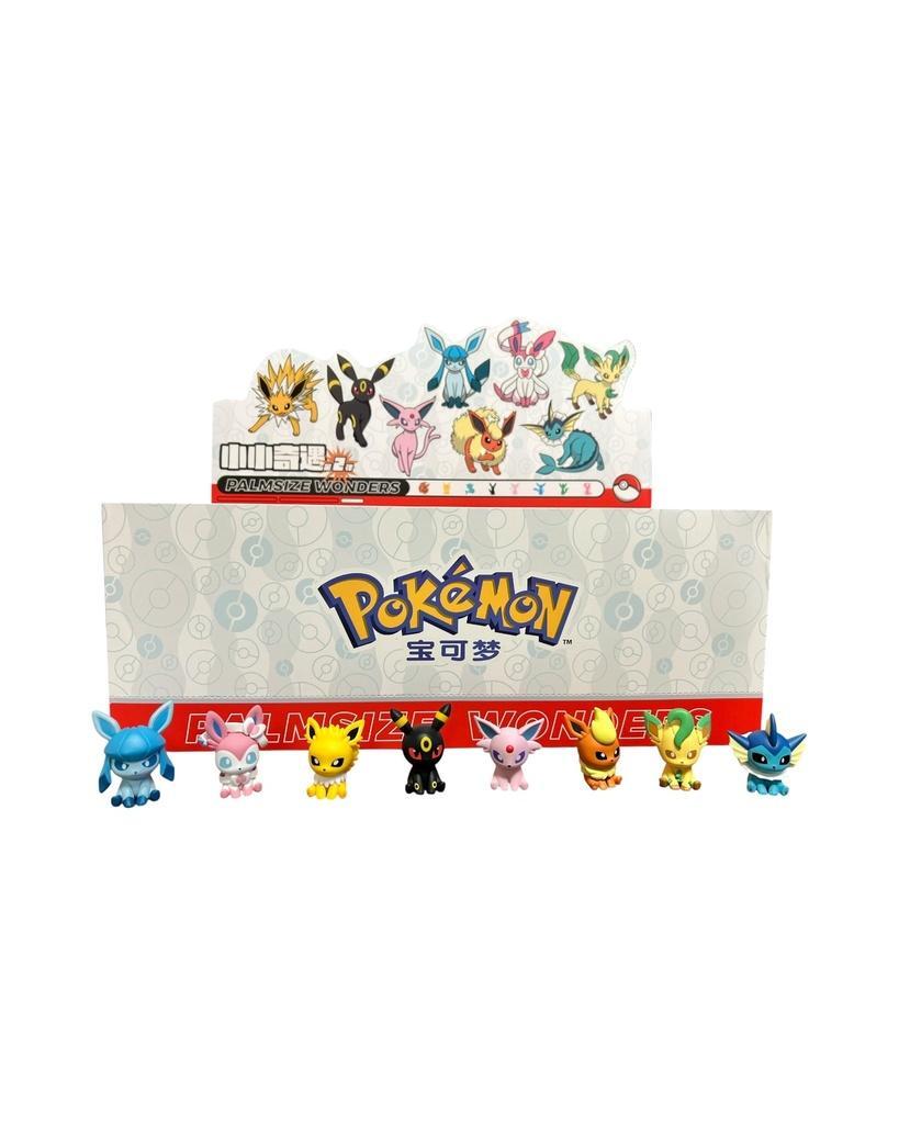 Pokémon palmsize Poké Ball collectibles featuring Eeveelutions figurines in display box.