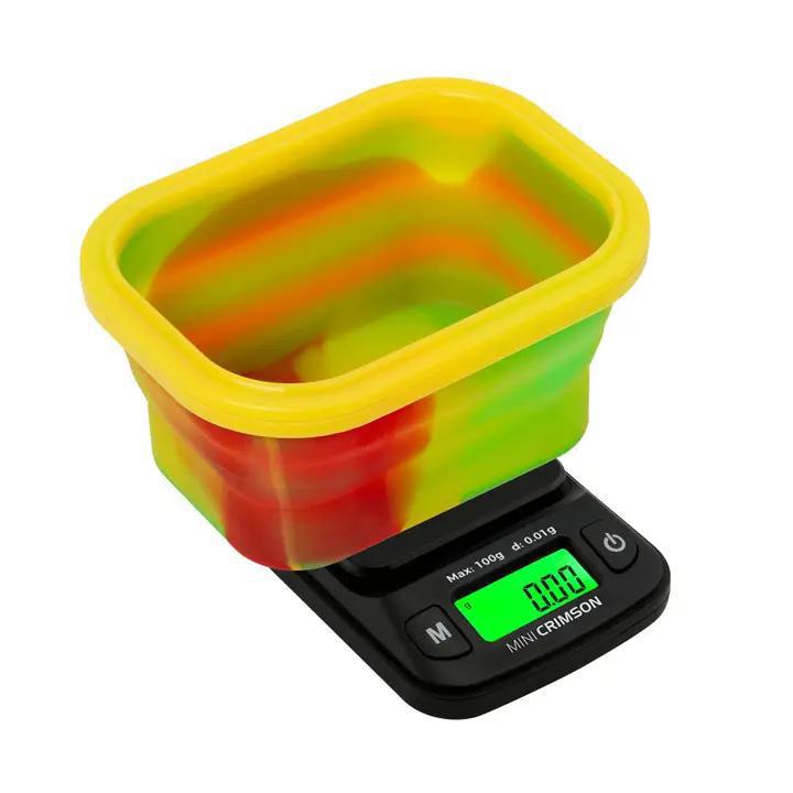 Truweigh Mini Crimson Digital Scale with colorful silicone bowl for measuring herbs, compact, portable, and easy to use.