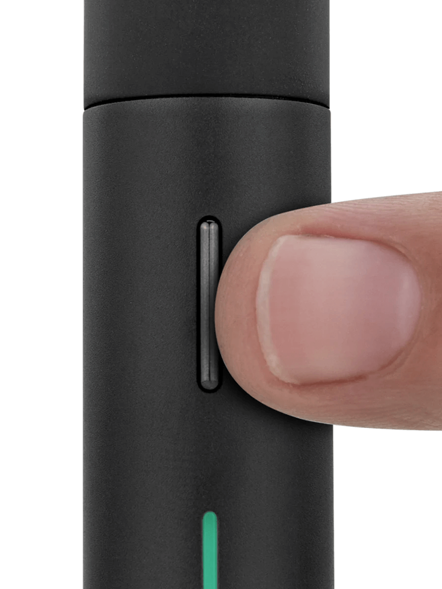 Close-up of Puffco Pivot Mobile Vaporizer with a finger pressing the button, showcasing its sleek design.