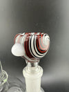 Filla John Glass 14mm Wig Wag bowl with vibrant red and black swirl patterns, showcasing functional glass art for smoking setups.