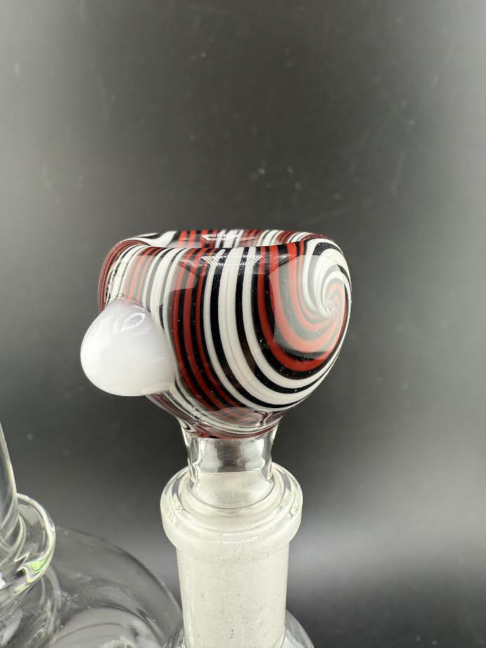 Filla John Glass 14mm Wig Wag bowl with vibrant red and black swirl patterns, showcasing functional glass art for smoking setups.