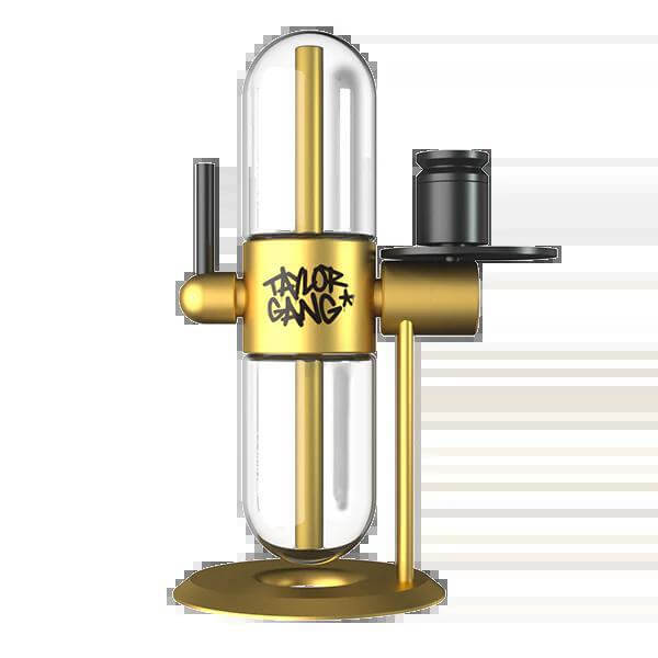 Taylor Gang glass water pipe with gold accents and modern design for smoking enthusiasts.