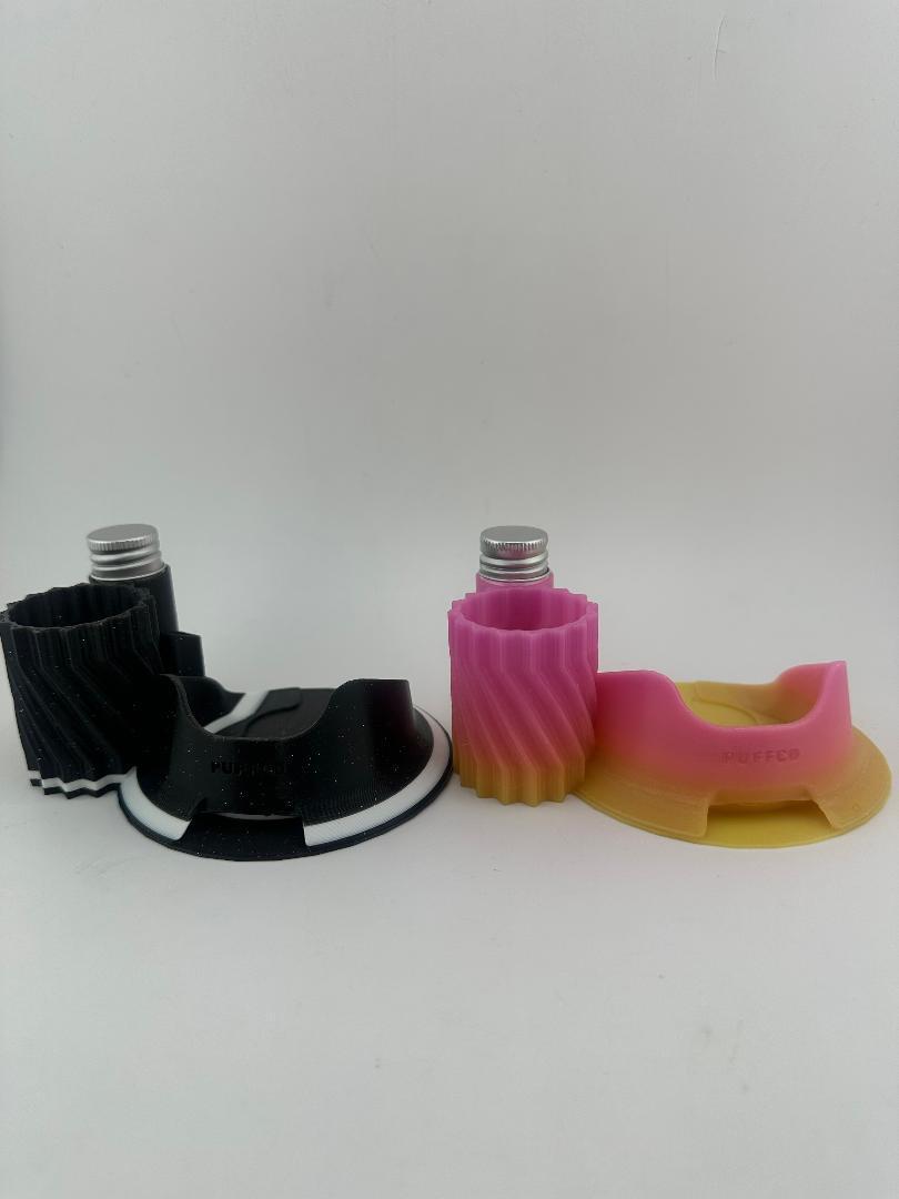 Puffco Peak Pro ISO Base Station with cleaning accessories in different colors for organized sessions.