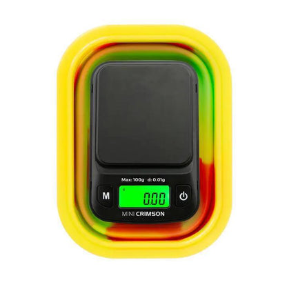 Truweigh Mini Crimson Digital Scale with colorful silicone bowl, precision weighing up to 100g, portable and dishwasher safe.