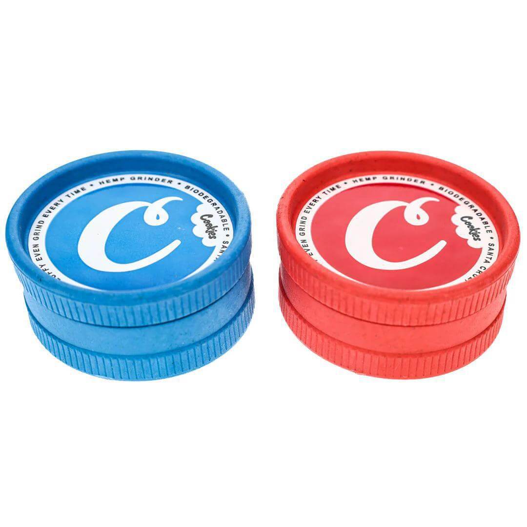 Santa Cruz Cookies 2pc Hemp Grinder in blue and red, eco-friendly and biodegradable design for cannabis enthusiasts.