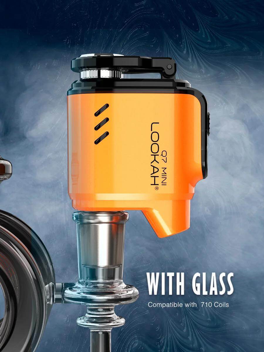 LOOKAH Q7 Mini E-Nail in orange, designed for 710 coils, attached to a glass pipe for easy use.