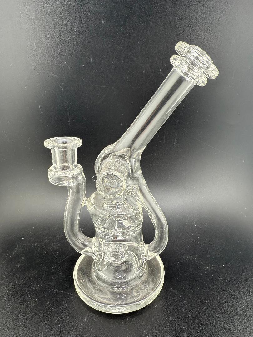 Clear handblown glass piece with 10mm joint and 90° angle, designed for upright rigs and stability. Domer Double That Looks Expensive