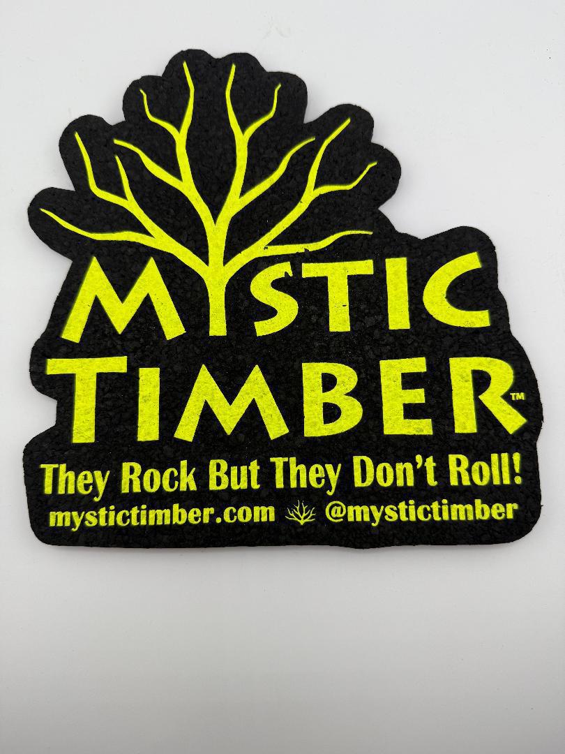 Mystic Timber Mood Mat featuring a tree design and text 'They Rock But They Don’t Roll' for home decor.