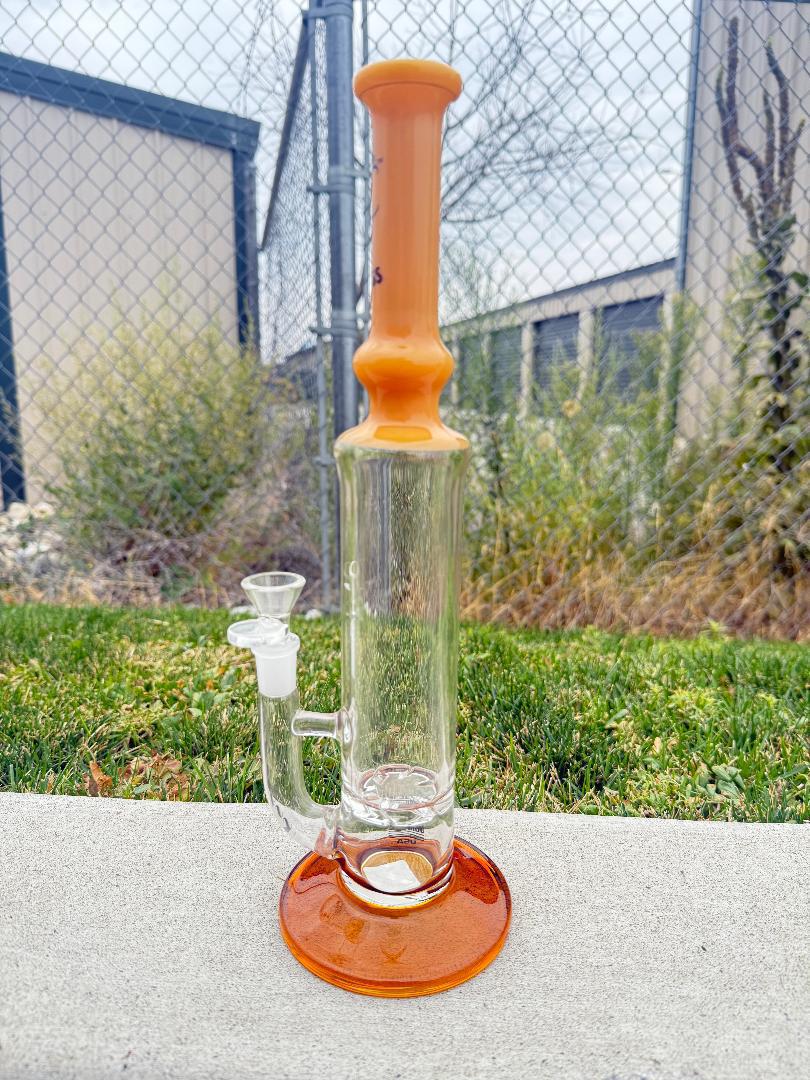 Fly Glass Straight Tube with 14mm 90° joint, showcasing clear design and vibrant orange accents.