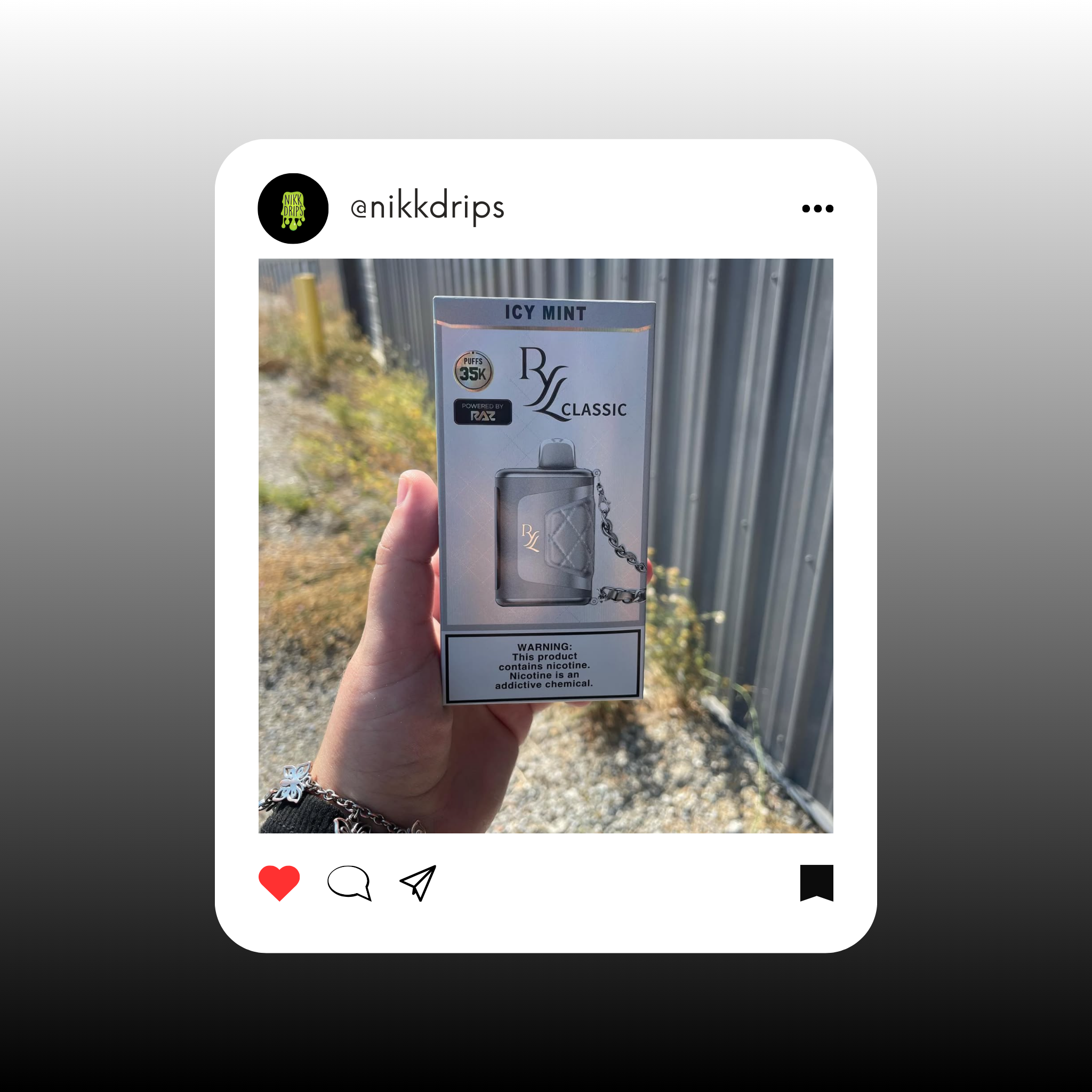 Person holding an Icy Mint vape package with a silver design outdoors, featuring branding and warning information.