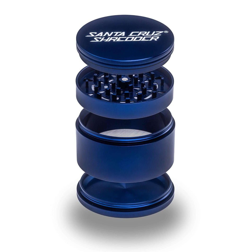 Santa Cruz Shredder 4-Piece Jumbo Grinder in blue, showcasing precision teeth and aluminum construction.