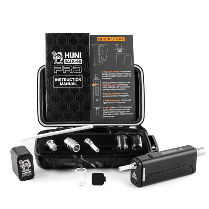 Huni Badger Portable Device Pro with instruction manual and accessories in a black case for easy herbal extract use.