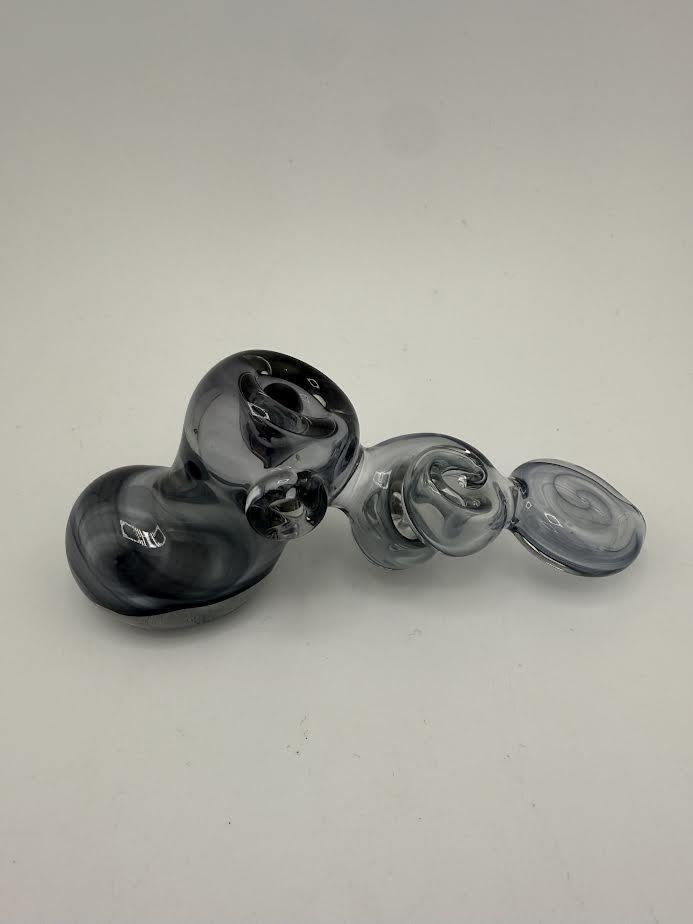 Mcdoogle Dry Hammer in dark blue glass showcasing intricate swirling design.