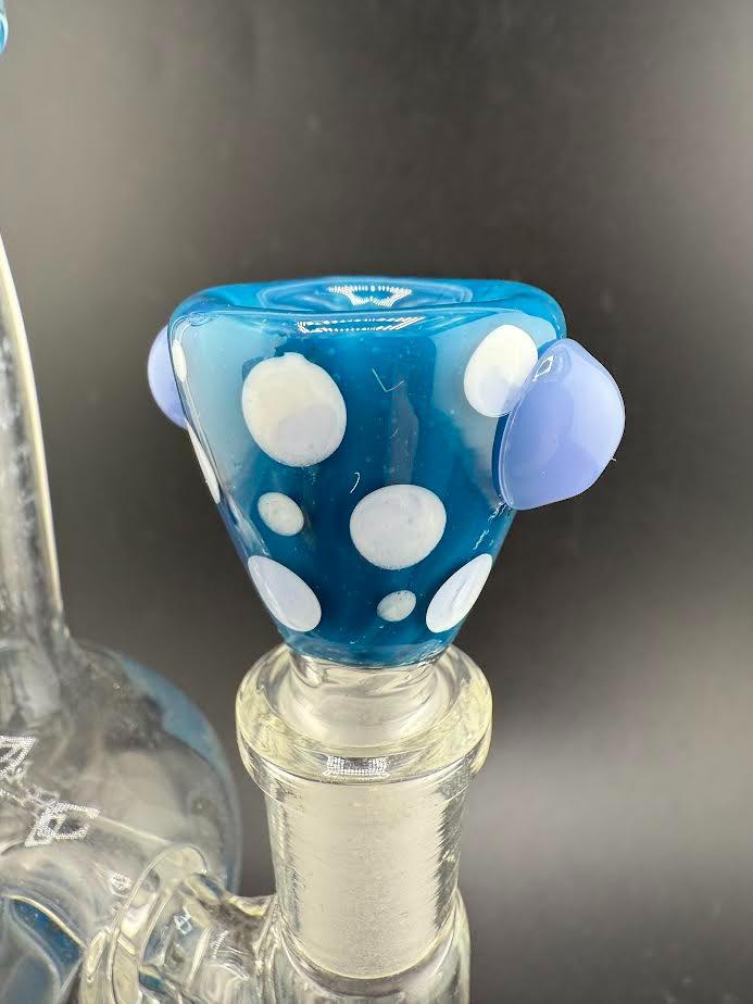 Polka dot 14mm bowl in blue with white spots and purple accents, perfect for enhancing your smoking experience.