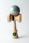 Sweets Kendama Stroh Pigeon Stripe Legend, featuring grey tama with holo flake stripe, white dot, and orange bevel accent.