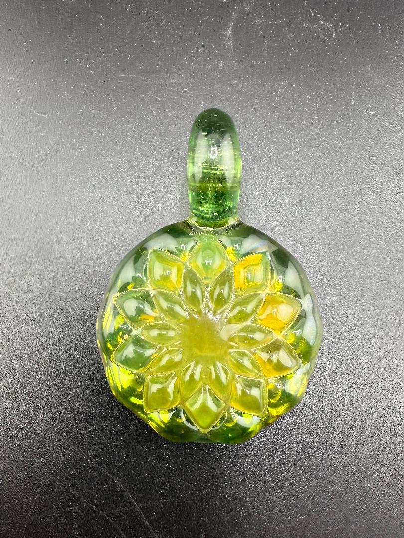 Mcdoogle Glass Retticello Molded Pendy - Handcrafted green glass pendant with intricate flower design.