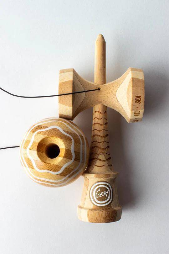 Sweets Kendama George Marshall V3 in bamboo, featuring a clean design and unique engravings, ideal for kendama enthusiasts.