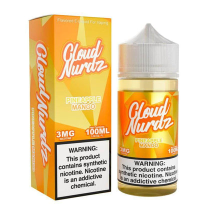 Cloud Nurdz Pineapple Mango e-liquid 100ml bottle and box, showcasing vibrant fruity flavors for vaping.