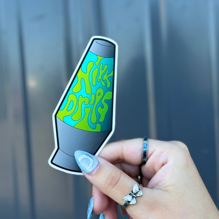BBB Sticker Lava Lamp in hand, showcasing vibrant colors and retro design, perfect for personalizing gear.