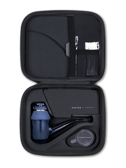 Puffco Proxy Kit open case showing vaporizer, joystick cap, and storage accessories in compact design.