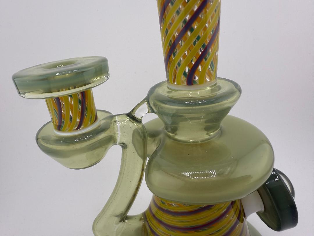 Bowman Glass X Vogel Glass Rettitube featuring colorful twisted design and unique shape for optimal smoking experience.